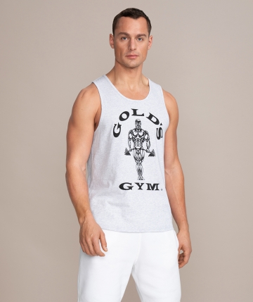 grey men’s tank top with a black Gold’s Gym ‘Muscle Joe’ logo on the front. Sleeveless top. Front view grey men’s tank top with a black Gold’s Gym ‘Muscle Joe’ logo on the front. Sleeveless top. Front view