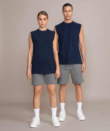 Navy unisex tank top from Gold's Gym. Sleeveless top with round neck and high-quality embroidered lettering on the front.  Navy unisex tank top from Gold's Gym. Sleeveless top with round neck and high-quality embroidered lettering on the front.