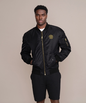 Black bomber jacket from Gold's Gym. Black long-sleeved top with yellow lining, embroidered Gold's Gym Weight Plate logo on the chest and... Black bomber jacket from Gold's Gym. Black long-sleeved top with yellow lining, embroidered Gold's Gym Weight Plate logo on the chest and high-quality zip on the front and upper left arm.