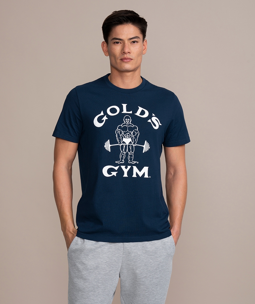 blaues Sport T-Shirt von Gold’s Gym. Kurzarm mit dem weißen Classic Joe Logo und weißer Schrift auf der Brust.  
