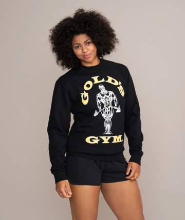 Schwarzes Sweatshirt mit weißem Gold’s Gym Muscle Joe Logo und der klassischen gelben Schrift auf der Vorderseite. Langärmeliges Oberteil aus Bio-Baumwolle... Schwarzes Sweatshirt mit weißem Gold’s Gym Muscle Joe Logo und der klassischen gelben Schrift auf der Vorderseite. Langärmeliges Oberteil aus Bio-Baumwolle für komfortablen Tragekomfort.
