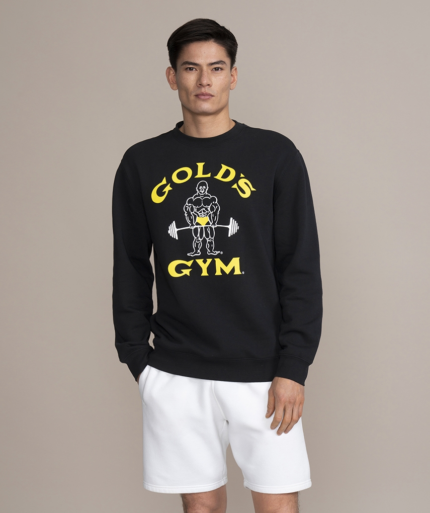Black sweatshirt with white Gold's Gym Classic Joe logo and yellow lettering on the front