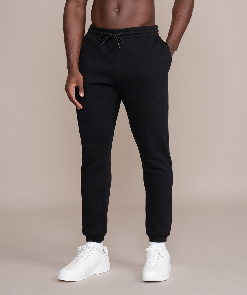 Black men's sweatpants from Gold's Gym. Sweatpants with elastic waistband and drawstring, front pockets and back patch pocket.