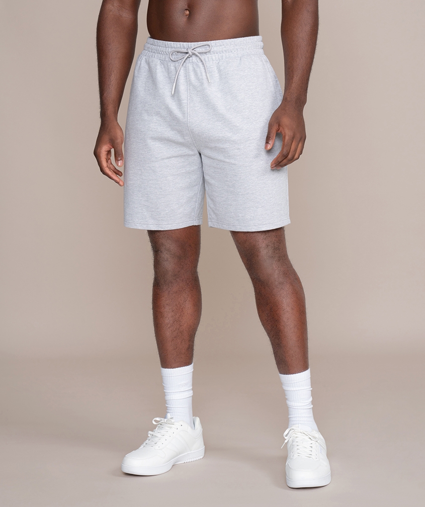 Grey sweat shorts from Gold's Gym. Sweat fabric shorts with elastic waistband and drawstring. Front pockets and back patch pocket.